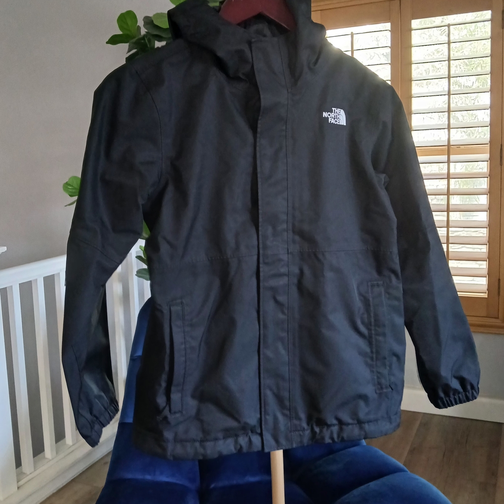 The North Face Rainy Jacketin Black. Size 10/12